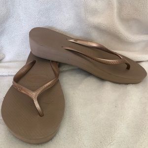 Havaianas gold wedge flip flops